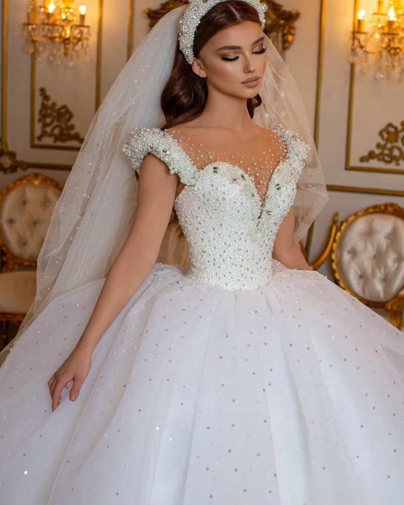 Glamorous Off-the-Shoulder Beaded Princess Wedding Dress with Pearl and Tulle