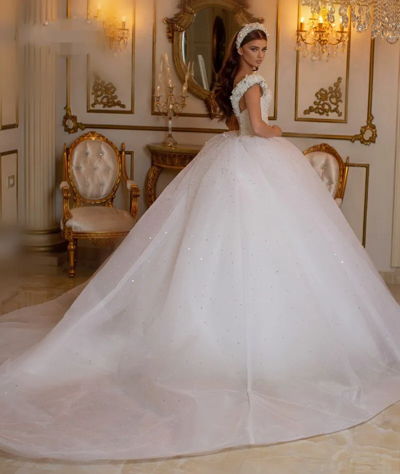 Glamorous Off-the-Shoulder Beaded Princess Wedding Dress with Pearl and Tulle