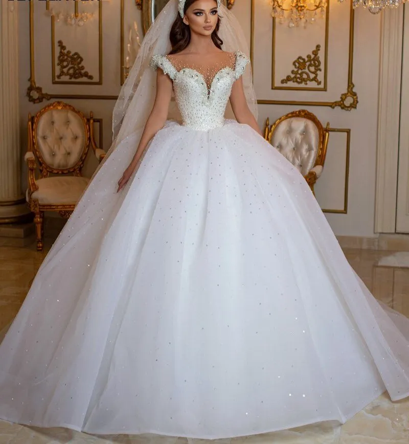 Glamorous Off-the-Shoulder Beaded Princess Wedding Dress with Pearl and Tulle