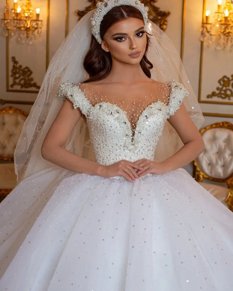 Glamorous Off-the-Shoulder Beaded Princess Wedding Dress with Pearl and Tulle